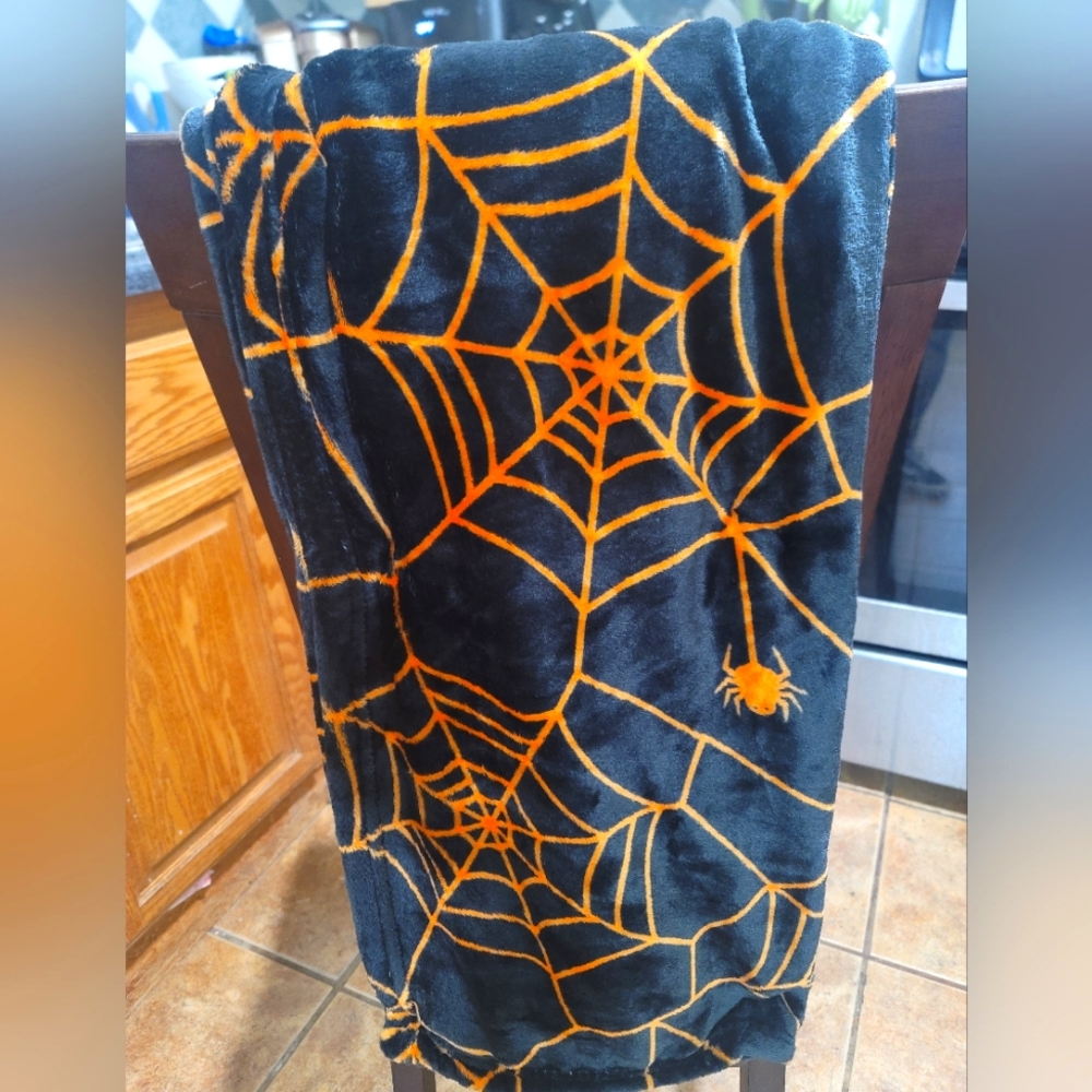 Spider web throw blanket